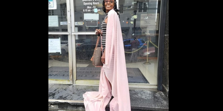 Allison Skinner-Bacchus in her pink curtain that she wore to gain entry into the Treasury building.