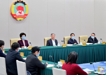Wang Yang, chairman of the Chinese People's Political Consultative Conference (CPPCC) National Committee, presides over a biweekly consultation session held by the CPPCC National Committee in Beijing, capital of China, Nov. 25, 2022. (Xinhua/Yue Yuewei)