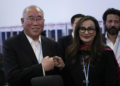 Xie Zhenhua, China's special envoy for climate, left, and Sherry Rehman, minister of climate change for Pakistan, pose for photos during a break in a closing plenary session at the COP27 U.N. Climate Summit, Sunday, Nov. 20, 2022, in Sharm el-Sheikh, Egypt.