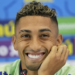 Brazil's Raphinha smiles during a press conference after a training session at the Grand Hamad stadium in Doha, Qatar, Monday, Nov. 21, 2022. Brazil will play their first match in the World Cup against Serbia on Nov. 24. (AP Photo/Andre Penner)
