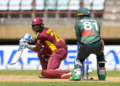 Former West Indies captain Nicholas Pooran plays a shot against Bangladesh at the Guyana National Stadium in Providence, Guyana, earlier this year. -