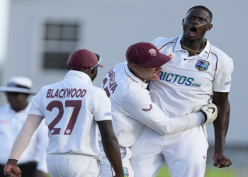 West Indies' Jason Holder celebrates the dismissal of England's Dan Lawrence during day one of their second cricket Test match at the Kensington Oval in Bridgetown, Barbados, Wednesday, March 16, 2022. (File, AP Photo/Ricardo Mazalan).