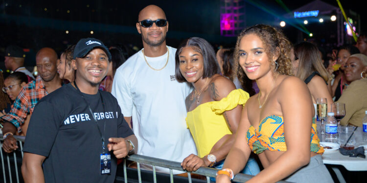 "(L-R) Regional Marketing Manager for Campari, distributors of Hennessy, Kamal Powell, Asafa Powell, Elaine Thompson-Herah, and Alyshia Powell"