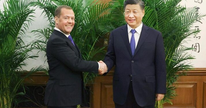 Xi Jinping, General Secretary of the Communist Party of China (CPC) Central Committee and Chinese president, meets with Chairman of the United Russia party Dmitry Medvedev, who visits China at the invitation of the CPC, at the Diaoyutai State Guesthouse in Beijing, capital of China, on December 21 (XINHUA)