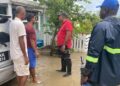 Minister Mustapha while visiting flood affected areas along the East Bank of Demerara last Saturday