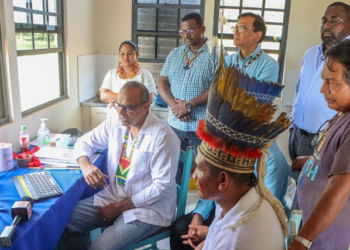 Health Minister Dr Frank Anthony along with officials at the launching that was held virtually