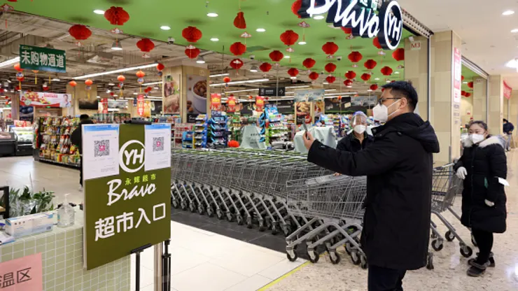 Starting Tuesday, public venues such as this supermarkets in Beijing no longer required people to show proof of a recent negative virus test.
China News Service | China News Service | Getty Images
