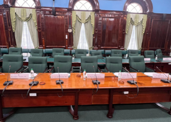The Government's side shows empty chairs
