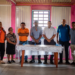 Minister Dharamlall, Minister Croal and Colonel Hussain with Vice Toshao of Jawalla, Terry Richmond (centre left), an officer from Kamarang, and residents of Jawalla village