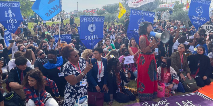 UN News/Laura Quiñones People protest for reparations for stolen land at COP27 in Sharm El-Sheikh in Egypt.