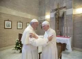 FILE - Pope Francis, left, embraces Emeritus Pope Benedict XVI, at the Vatican, June 28, 2017. Pope Francis on Wednesday, Dec. 28, 2022, said his predecessor, Pope Emeritus Benedict XVI, is “very sick," and he asked the faithful to pray for the retired pontiff so God will comfort him “to the very end.” (L'Osservatore Romano/Pool Photo via AP, File)