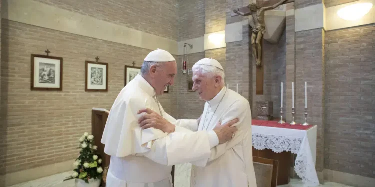FILE - Pope Francis, left, embraces Emeritus Pope Benedict XVI, at the Vatican, June 28, 2017. Pope Francis on Wednesday, Dec. 28, 2022, said his predecessor, Pope Emeritus Benedict XVI, is “very sick," and he asked the faithful to pray for the retired pontiff so God will comfort him “to the very end.” (L'Osservatore Romano/Pool Photo via AP, File)