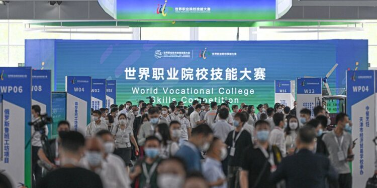 The World Vocational College Skills Competition is held at the national convention and exhibition center in Tianjin, north China, Aug. 19, 2022. (Xinhua/Sun Fanyue)