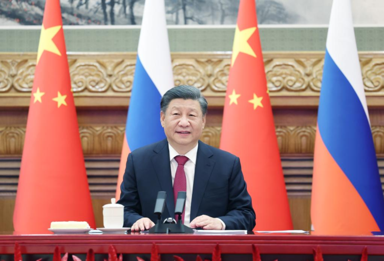 Chinese President Xi Jinping meets with Russian President Vladimir Putin via video link in Beijing, capital of China, Dec. 30, 2022. (Xinhua/Yao Dawei)