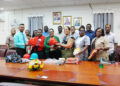 Deputy Chief Education Officer (Technical), Dr. Ritesh Tularam handing-over the items to teachers of the schools today