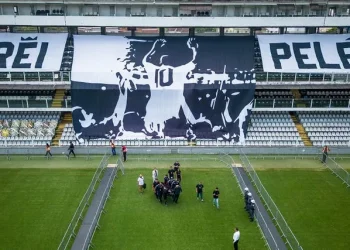 Pele’s coffin was placed on the centre circle in a ceremony on Monday morning (Matias Delacroix/AP)