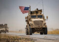 US military vehicles drive by an oil field in northeastern Syria on July 1, 2020. File photo: VCG