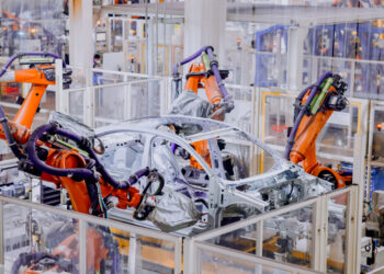 Automated robots weld car parts in a workshop of FAW-Volkswagen Automotive Co. Ltd., a Sino-German joint venture, in Qingdao, Shandong Province, on December 20, 2022 (XINHUA)