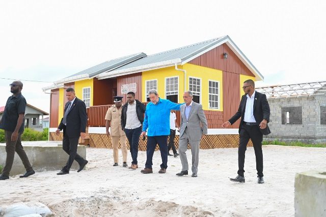 St. Vincent and the Grenadines, Prime Minister Dr Ralph Gonsalves, Housing and Water Minister, Collin Croal, Local Government and Regional Development Minister, Nigel Dharamlall and DuraVilla’s Chief Executive Officer Rafeek Khan at one of the homes in Great Diamond