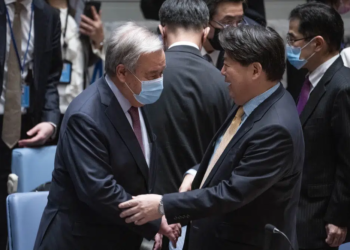 Hayashi Yoshimasa, Minister for Foreign Affairs of Japan, right, arrives with United Nations Secretary General Antonio Guterres before chairing a Security Council meeting at United Nations headquarters, Thursday, Jan. 12, 2023. (AP Photo/John Minchillo)