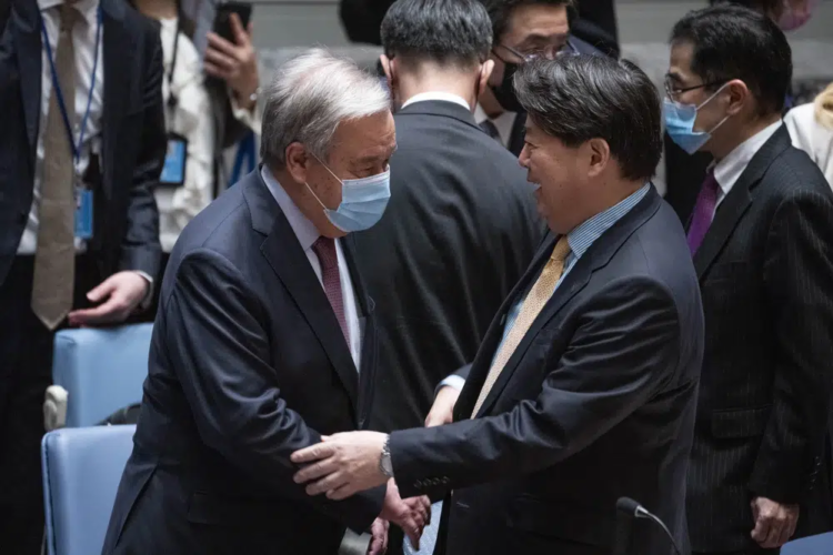 Hayashi Yoshimasa, Minister for Foreign Affairs of Japan, right, arrives with United Nations Secretary General Antonio Guterres before chairing a Security Council meeting at United Nations headquarters, Thursday, Jan. 12, 2023. (AP Photo/John Minchillo)