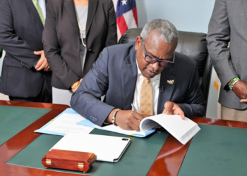 Governor Albert Bryan signing the Virgin Islands Cannabis Use Act today. Photo: Government House