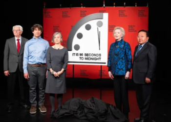 Scientists around the Doomsday Clock set at 90 seconds to midnight (NBC Photo)