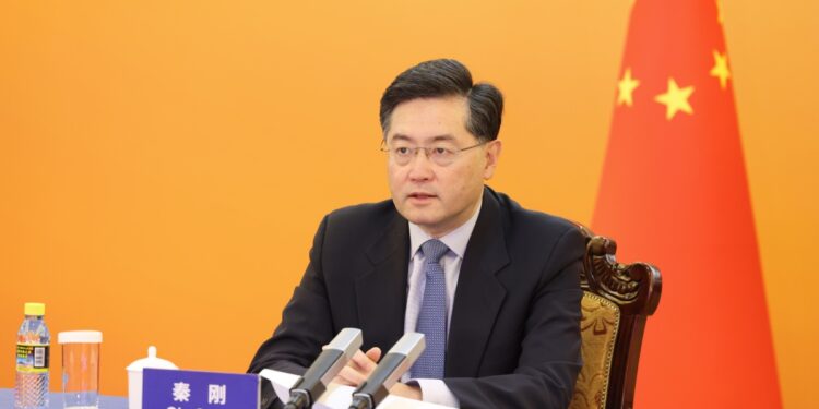 Foreign Minister Qin Gang participates in the opening of the 14th "Love Knows No Borders" international charity sale via video link in Beijing on Jan 17, 2023. [Photo by Feng Yongbin/chinadaily.com.cn]