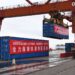 A container carrying supplies for Hong Kong is loaded onto a ship at Dachanwan wharf of Shenzhen port, south China's Guangdong Province, Feb. 21, 2022. (Xinhua/Liang Xu)