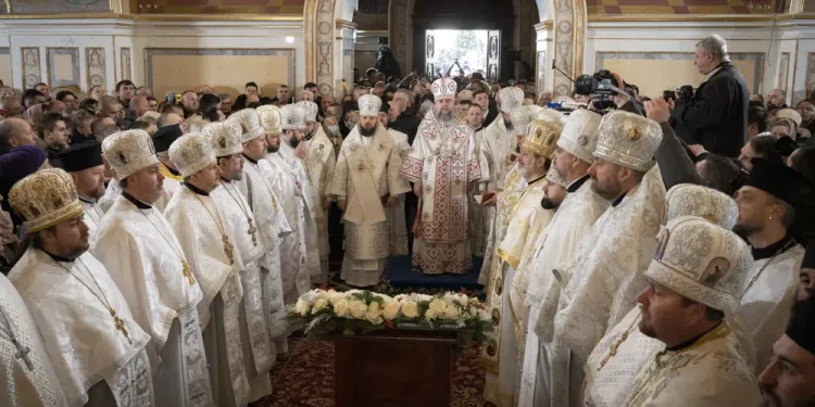 Metropolitan Epiphanius, center right, and priests deliver an Orthodox Christmas service inside the nearly 1,000-year-old Pechersk Lavra Cathedral of Kyiv, Ukraine, Saturday, Jan. 7, 2023. Hundreds of Ukrainians heard the Orthodox Christmas service in the Ukrainian language for the first time at Kyiv’s 1,000-year-old Lavra Cathedral on Orthodox Christmas Day, a demonstration of independence from the Russian orthodox church. (AP Photo/Roman Hrytsyna)