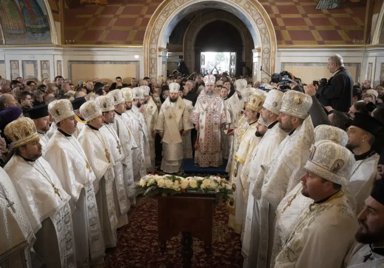 Metropolitan Epiphanius, center right, and priests deliver an Orthodox Christmas service inside the nearly 1,000-year-old Pechersk Lavra Cathedral of Kyiv, Ukraine, Saturday, Jan. 7, 2023. Hundreds of Ukrainians heard the Orthodox Christmas service in the Ukrainian language for the first time at Kyiv’s 1,000-year-old Lavra Cathedral on Orthodox Christmas Day, a demonstration of independence from the Russian orthodox church. (AP Photo/Roman Hrytsyna)