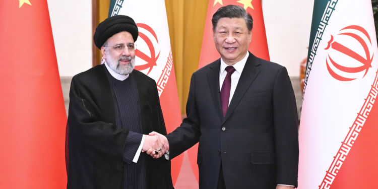 Chinese President Xi Jinping welcomes visiting Iranian President Ebrahim Raisi at the Great Hall of the People in Beijing on February 14, 2023. Photo: Xinhua