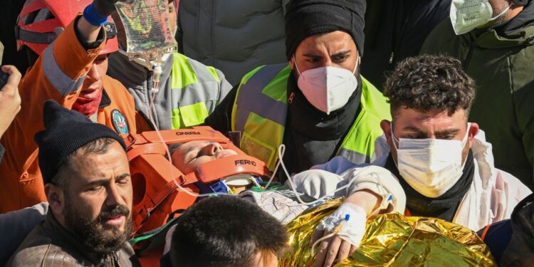 Aleyna Olmez is rescued alive from the rubble of a collapsed apartment in Kahramanmaras in southern Turkey, on February 16, 2023.