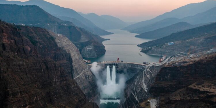 This aerial photo taken on Dec. 19, 2022 shows a view of the Baihetan hydropower station located on the Jinsha River, the upper section of the Yangtze River in southwest China. (Xinhua/Hu Chao)