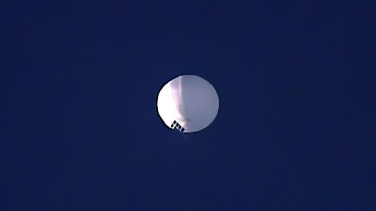 A high altitude balloon, which U.S. officials have speculated as a spy balloon from China, floats over Billings, Mont., on Wednesday, Feb. 1, 2023. Another balloon was detected over Latin America on Friday evening. (Larry Mayer/The Billings Gazette via AP)