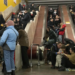People gather in a subway station being used as a bomb shelter during a Russian rocket attack in Kyiv, Ukraine, Friday, Feb. 10, 2023. (AP Photo/Efrem Lukatsky)