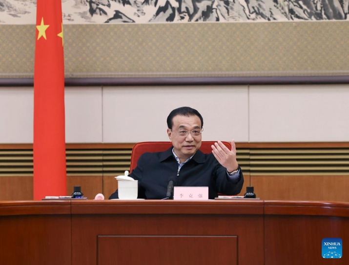 Chinese Premier Li Keqiang chairs a seminar to solicit opinions on the draft government work report from grassroots organization representatives and people from all walks of life, in Beijing, capital of China, on February 6. Vice Premier Han Zheng attended the seminar (XINHUA)