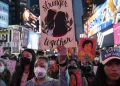 Demonstrators at the Justice for Asian Women Rally in Times Square. (Lev Radin/Pacific Press/LightRocket via Getty Images)