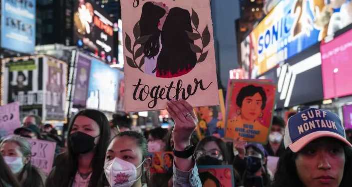 Demonstrators at the Justice for Asian Women Rally in Times Square. (Lev Radin/Pacific Press/LightRocket via Getty Images)