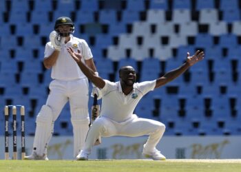 West Indies's bowler Kemar Roach, right, successfully appeals for a caught behind against South Africa's batsman Aiden Markram during the third day of the first test cricket match at Centurion Park in Pretoria, South Africa, Thursday, March 2, 2023. (AP Photo/Themba Hadebe).