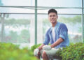 Victor Lo at the aquaponics farm he set up with two friends in Jiangmen, Guangdong province. China Daily