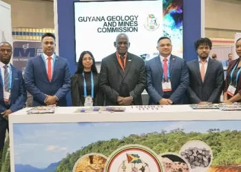 Minister of Home Affairs, Robeson Benn (center), Minister of Natural Resources, Vickram Bharrat (center right), and members of GGMC and the Ministry of Natural Resources