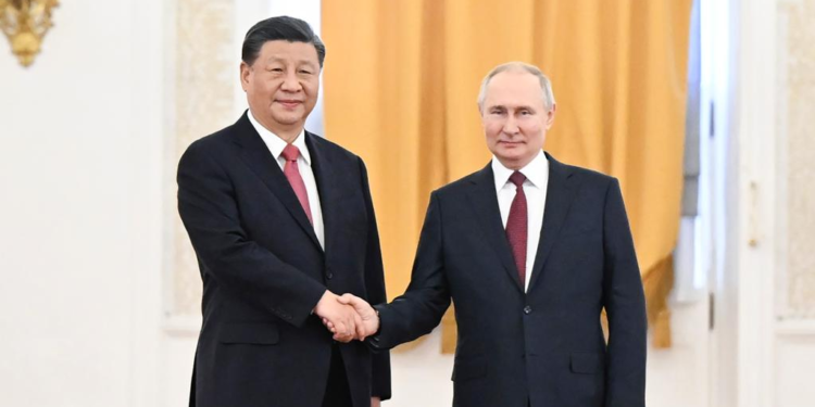 Chinese President Xi Jinping shakes hands with Russian President Vladimir Putin at the Kremlin in Moscow, Russia, March 21, 2023. Xi on Tuesday held talks with Putin in Moscow. Putin held a solemn welcome ceremony for Xi Jinping at the St. George's Hall. (Xinhua/Xie Huanchi)