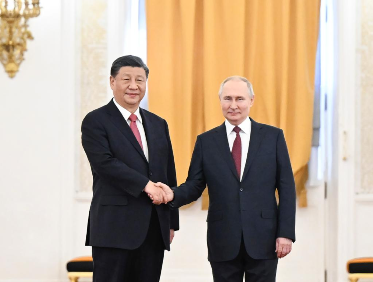 Chinese President Xi Jinping shakes hands with Russian President Vladimir Putin at the Kremlin in Moscow, Russia, March 21, 2023. Xi on Tuesday held talks with Putin in Moscow. Putin held a solemn welcome ceremony for Xi Jinping at the St. George's Hall. (Xinhua/Xie Huanchi)