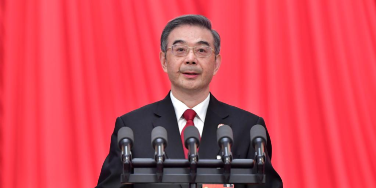 Zhou Qiang, president of the Supreme People's Court (SPC), delivers a work report of the SPC at the second plenary meeting of the first session of the 14th National People's Congress (NPC) at the Great Hall of the People in Beijing, capital of China, March 7, 2023. (Xinhua/Li Tao)