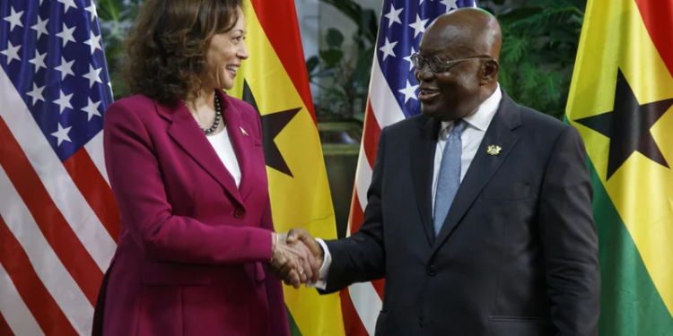 U.S. Vice President Kamala Harris is welcomed by Ghanaian President Nana Akufo-Addo in Accra, Ghana, on Monday. Harris is on a seven-day African visit that will also take her to Tanzania and Zambia. Misper Apawu/AP