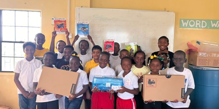 The current members of the Hopetown STEM Club alongside their teachers