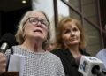 Jean Hargadon Wehner speaks about the release of the redacted report on child sexual abuse in the Catholic Archdiocese of Baltimore by the Maryland Attorney General's Office on Wednesday, April 6, 2023, in Baltimore. Standing next to her is Teresa Lancaster. (Kim Hairston/The Baltimore Sun via AP)