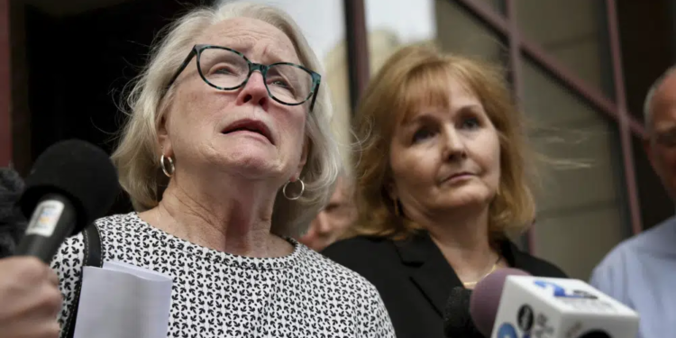 Jean Hargadon Wehner speaks about the release of the redacted report on child sexual abuse in the Catholic Archdiocese of Baltimore by the Maryland Attorney General's Office on Wednesday, April 6, 2023, in Baltimore. Standing next to her is Teresa Lancaster. (Kim Hairston/The Baltimore Sun via AP)