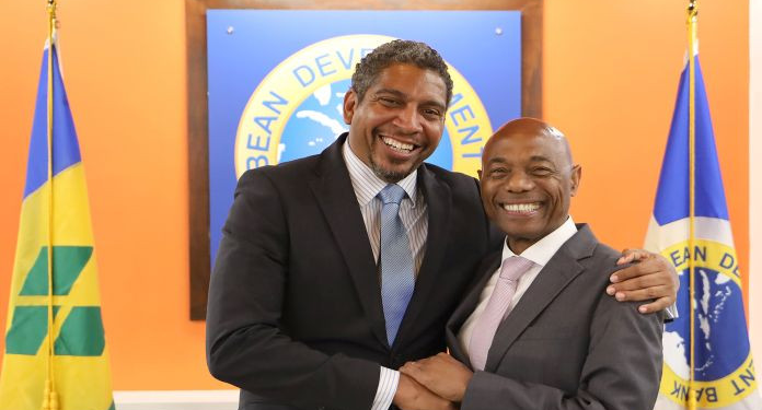 Governor and Finance Minister of Saint Vincent and the Grenadines, Camillo Gonsalves and CDB President, Dr Hyginus ‘Gene’ Leon.